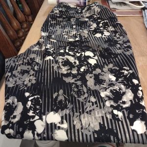 Black whit and tan pants with flowers